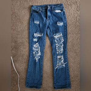 Distressed Blue Jeans